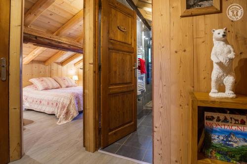 Ένα ή περισσότερα κρεβάτια σε δωμάτιο στο Chalet 13 personnes-Le Vanvolet