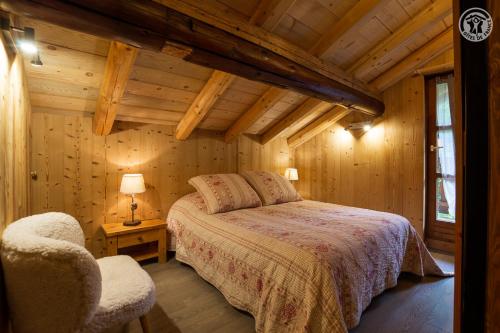 Ένα ή περισσότερα κρεβάτια σε δωμάτιο στο Chalet 13 personnes-Le Vanvolet