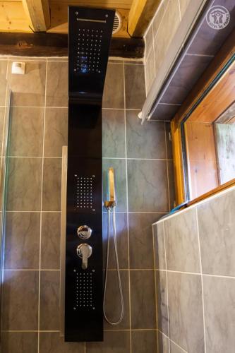 Ένα μπάνιο στο Chalet 13 personnes-Le Vanvolet