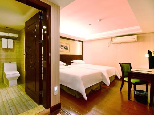 Katil atau katil-katil dalam bilik di Vienna Hotel Shenzhen Railway station