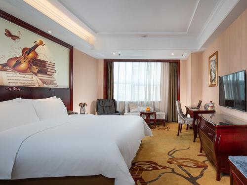 Galeriebild der Unterkunft Vienna hotel ( maanshan park post golden eagle international shop) in Ma'anshan