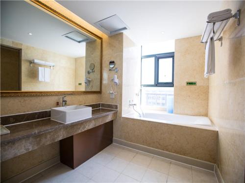 Ένα μπάνιο στο Vienna Hotel Zhumadian Huayuan Xuefu