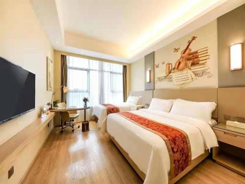 Vienna International Hotel Chong Qing Yu Bei Airportにあるベッド