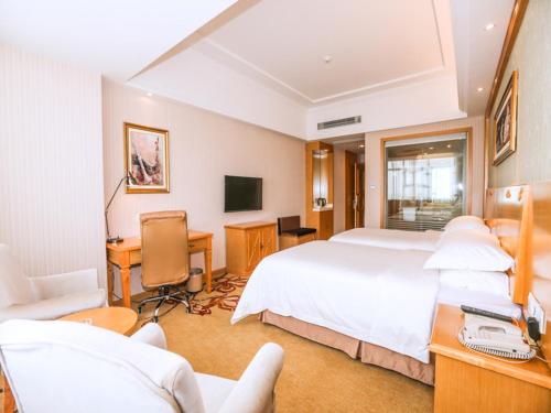 Μια τηλεόραση ή/και κέντρο ψυχαγωγίας στο Vienna Hotel Yingcheng Hai Mountain Yingcheng