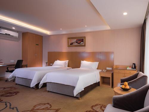 Fotografie z fotogalerie ubytování Vienna 3 Best Hotel Dongguan Liaobu Veicle City v destinaci Liaobu