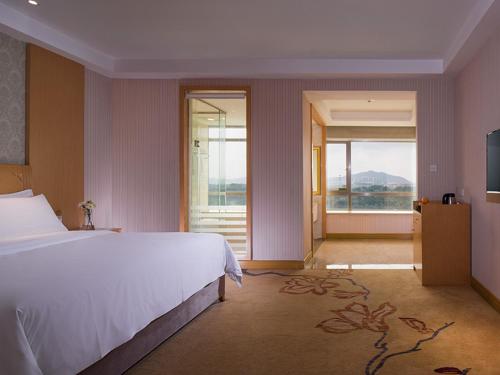 Fotografie z fotogalerie ubytování Vienna 3 Best Hotel Dongguan Liaobu Veicle City v destinaci Liaobu