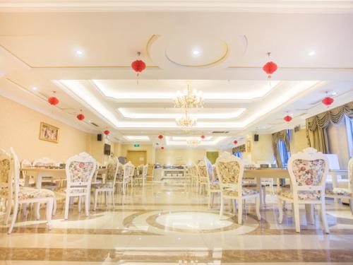 Restaurant o un lloc per menjar a Vienna Hotel Jiangsu Xuzhou Pengcheng Square