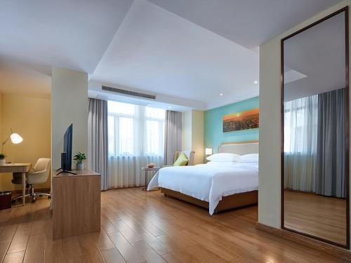 Katil atau katil-katil dalam bilik di Vienna Hotel (Dongmin Road Nanning)