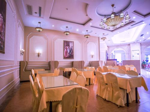 Restaurace v ubytování Vienna International Hotel Huizhou South Railway Station