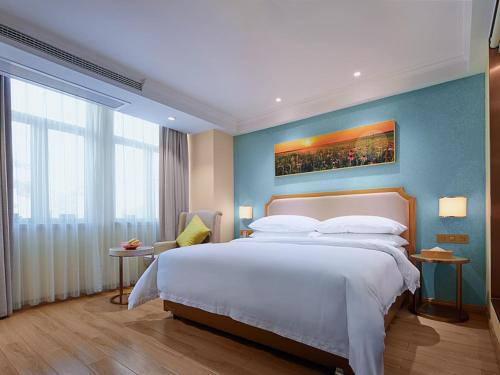 Katil atau katil-katil dalam bilik di Vienna Hotel (Dongmin Road Nanning)