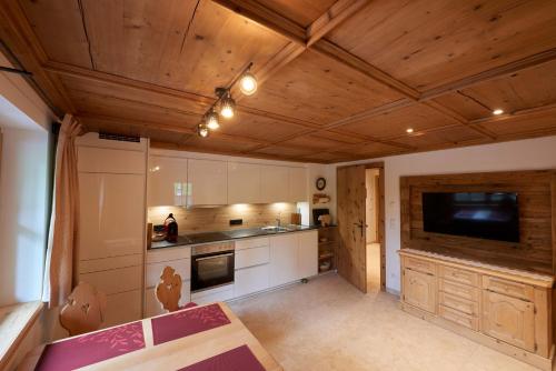 Kuchyň nebo kuchyňský kout v ubytování Saukaserstub'n Apartments - Ferienwohnung Schützkogel