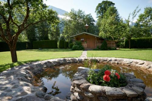 Κήπος έξω από το Saukaserstub'n Apartments - Ferienwohnung Schützkogel