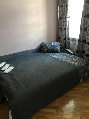 En eller flere senge i et værelse på Iren Lviv apartment