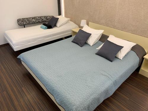 Cama o camas de una habitación en Sunset Apartments