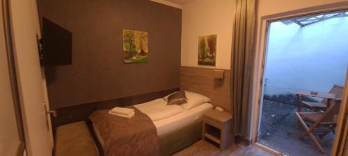 Postel nebo postele na pokoji v ubytování Hotel Cara Vita Cologne