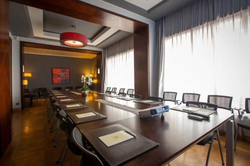 a large conference room with a long table and chairs at Hotel Atlantic Agdal in Rabat