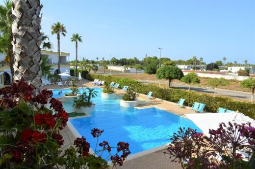 Der Swimmingpool an oder in der Nähe von Residence Club Costa D'Oriente