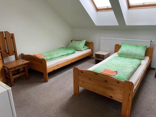 Postel nebo postele na pokoji v ubytování Ubytování Lipůvka