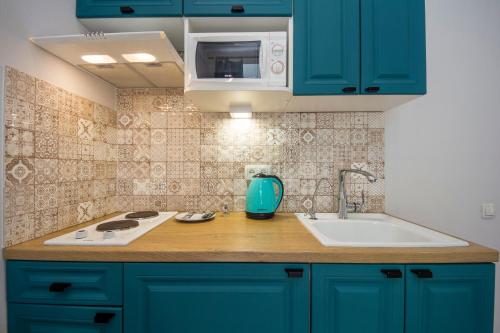 Dapur atau dapur kecil di Design Apartments Ploshcha Ukrainskykh Heroiv Area