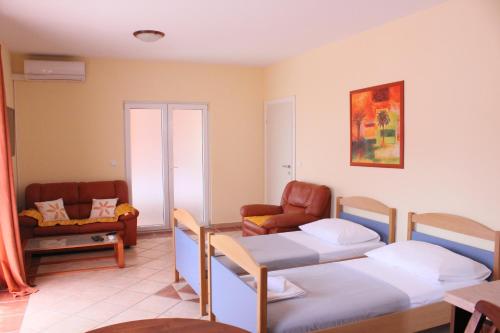 Postel nebo postele na pokoji v ubytování Apartment Luce