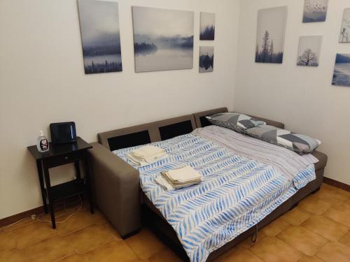 A bed or beds in a room at Anna's Apartment, the Heart of Bologna.