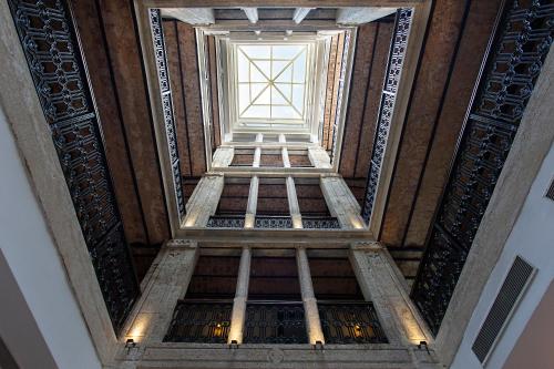 a view of the ceiling of a building with a window at Mest Hotel Istanbul Sirkeci in Istanbul