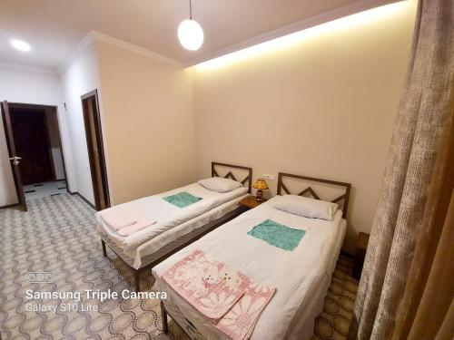 a room with two beds in a room at B&B Odzun in Odzun