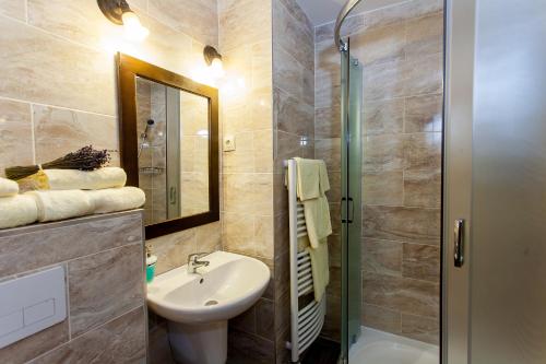 Koupelna v ubytování Hotel Bacchus