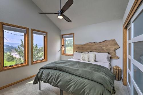 Una cama o camas en una habitación de Evergreen Mountain Duplex with Trail Access!