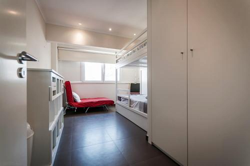 En eller flere senge i et værelse på Amazing Apartment in Costa da Caparica