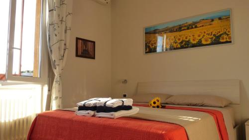 En eller flere senge i et værelse på Residenza Mazzini