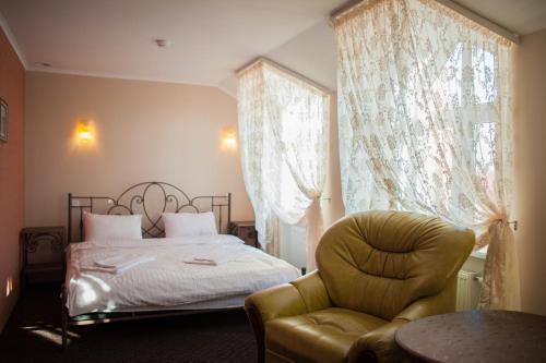 Кровать или кровати в номере Отель Зелёный Клин