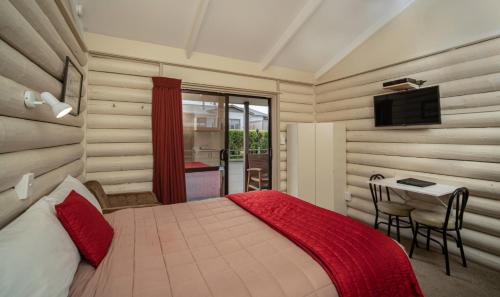 En eller flere senger på et rom på Welcome Inn Motel Levin