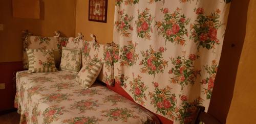 Ένα ή περισσότερα κρεβάτια σε δωμάτιο στο Agriturismo Fiore di Campo