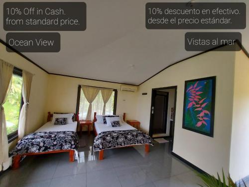Ein Bett oder Betten in einem Zimmer der Unterkunft Casita Génesis - Bahia Drake Bay