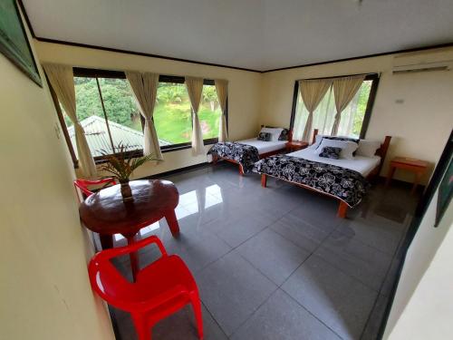 Ein Bett oder Betten in einem Zimmer der Unterkunft Casita Génesis - Bahia Drake Bay