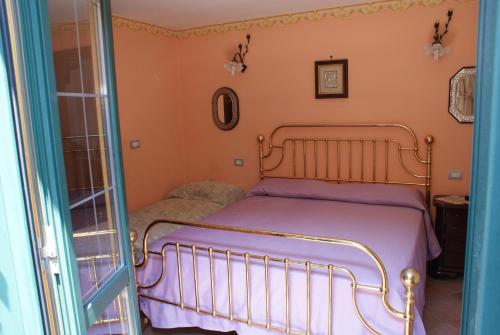 Postel nebo postele na pokoji v ubytování B&B Casa Armonia