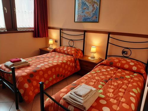 Postel nebo postele na pokoji v ubytování BorgoAntico Affittacamere