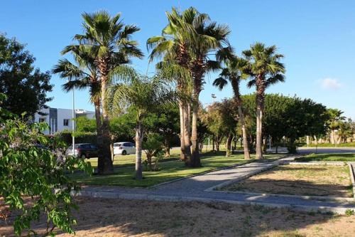 Jardín al aire libre en Appartement Familial avec Jardin, Résidence avec Piscine Dar El Bahr