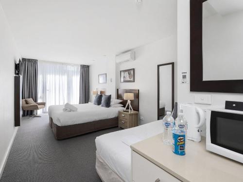 Postel nebo postele na pokoji v ubytování Resort Hotel Room 107