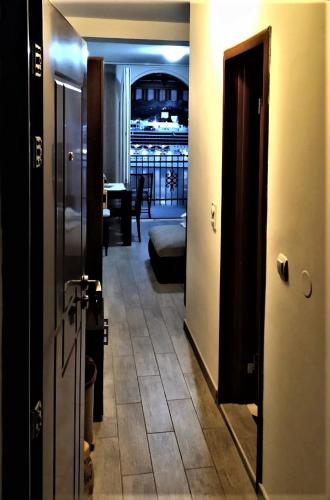 a hallway with a door leading to a room at NEW STUDIO MUO in Kotor