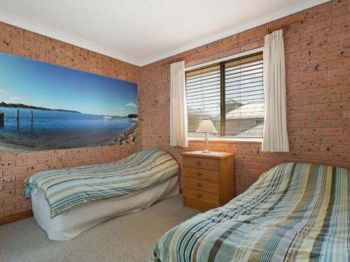 Postel nebo postele na pokoji v ubytování Grand Pacific 1 Unit 3 - First Floor