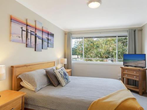 Katil atau katil-katil dalam bilik di Luxury Boardwalk Apartment Unit 7