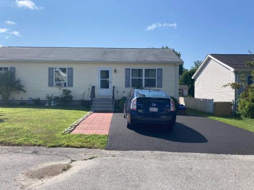 a car parked in front of a house at Dont Get Stucked In Boston Traffic in New Bedford