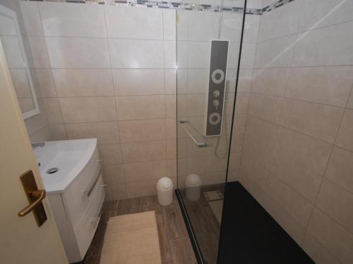 a bathroom with a shower with a sink and a toilet at Appartement Menton, 2 pièces, 4 personnes - FR-1-196-178 in Menton
