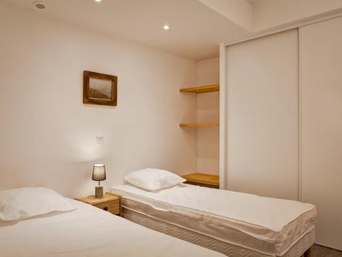 Krevet ili kreveti u jedinici u okviru objekta Appartement Brides-les-Bains, 4 pièces, 6 personnes - FR-1-512-138