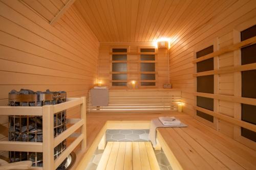 a room of a sauna with a bench in it at Casa di Pino EcoLodge Hotel in Žabljak