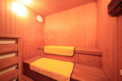 a small cabin with two beds in it at Soratoniwa Atami Izusan in Atami