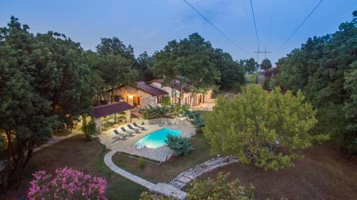 an aerial view of a house with a swimming pool at Villa Amalia in Široki Brijeg