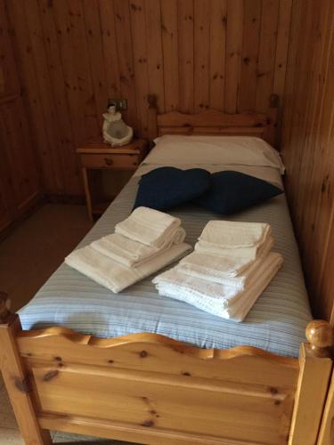 Una cama o camas en una habitación de Chalet Bucaneve
